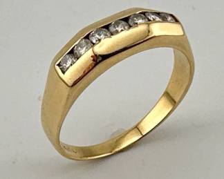 14kt channel set 7 stone diamond band