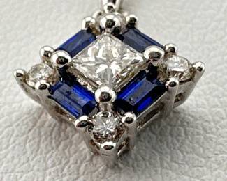 14kt white gold necklace with diamonds and baguette sapphires