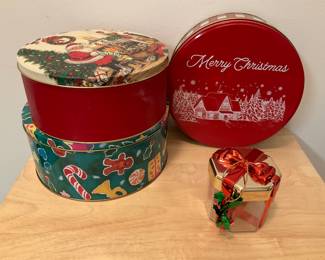 M255. 3 Christmas cookie tins and small gift box $2