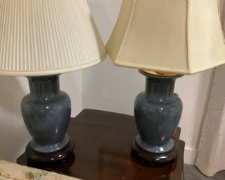 M236 pair of glazed slate blue lamps (shades do not match) with wood base $45