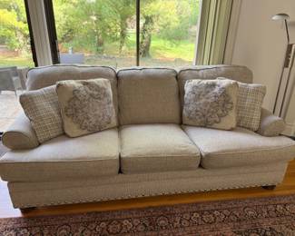 Gently used neutral sofa, 5 years old but stored and unused for 2 years.  