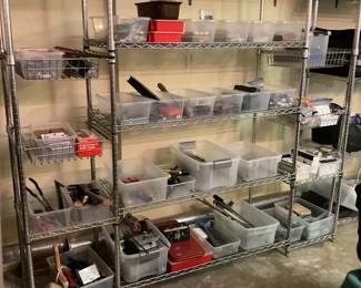 Some tools still left as well as this metal shelf unit