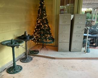 Tree and birdbaths sold File cabinets still available