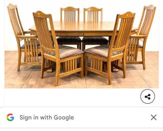 8 chairs , 4 leafs  solid oak mission  style table great condition 
