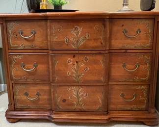 Beautiful.
Pulaski country pine bachelor chest with painted floral motif. 