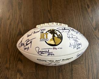 The Jet Award Football signed by Johnny Rodgers, Mike Rozier, Eric Crouch, Met Gray, Savon Scarver, Rick Upchurch, Russel Harrison, Greg Pruitt