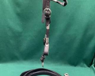 523  Black leather browband head stall and reins with ferrule accents 