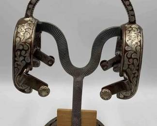 55  E Garcia engraved and inlaid sterling silver spurs 