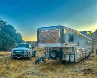 48  2014 Platinum Living Quarters with 12 short wall, Outlaw conversion , mid tack an 8x16 stock back 