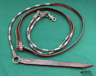 717  Dark leather romal rein set 