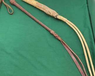 45  Two quirts one leather one rawhide 