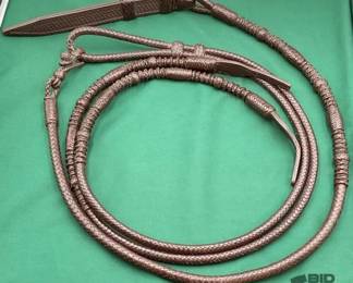 709  Dark leather braided romal reins 