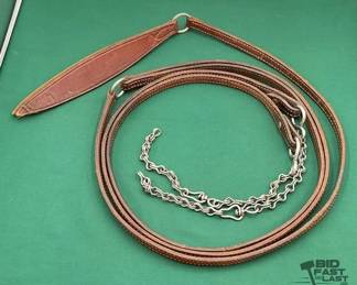 718  Dark leather romal rein set with slobber chains 
