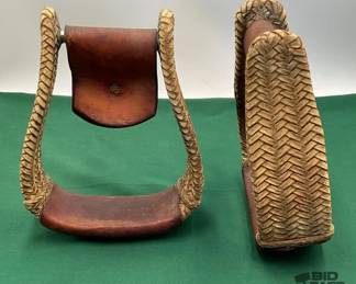 390 Pair of woven rawhide western stirrups