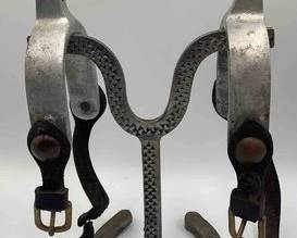 83  Aluminum spurs with spur straps 