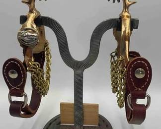 71  2 Pair vaquero style spurs  one adult size  Hercules Bronze and one kids size 