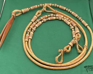 708  Vaquero style braided rawhide romal reins 