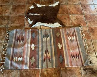 742  Hand woven blanket and small hide 