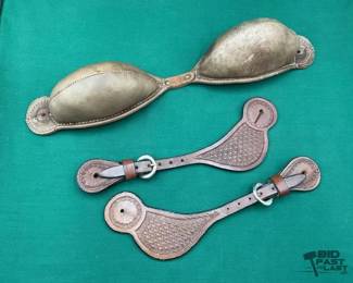 676  Buckin rolls and spur straps 