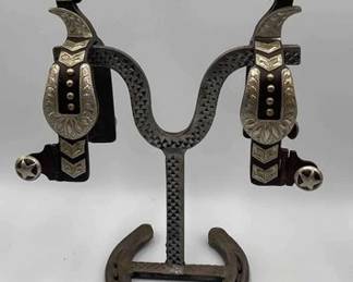 82  Black iron Vaquero style spurs with silver overlay 