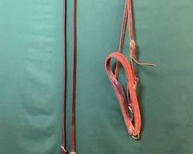 755  Leather tie down nose band and roping reins 