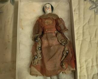 mini-Victorian doll from the mid to late 1800s 