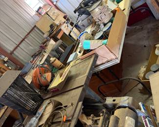 Packed outbuilding with vintage tools