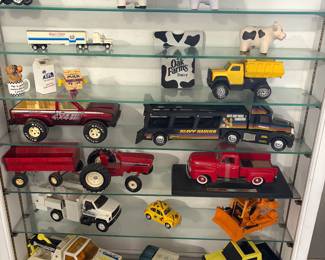 Vintage toy cars, trucks, and tractors