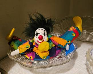One of three soft clown dolls