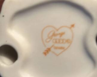 Porcelain Figurine of a Graduate with a Cat