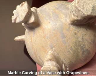 Marble Carving of a Vase with Grapevines
