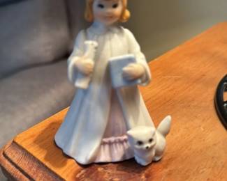 Porcelain Figurine of a Graduate with a Cat