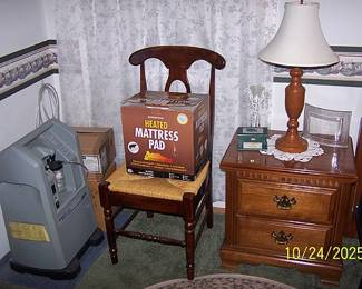Oxygen machine, night stand and reed bottom chair
