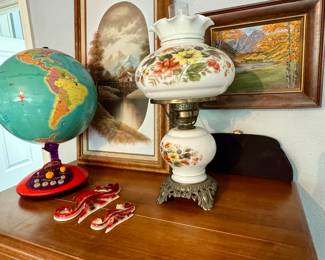 Globe, gas lamp, purse