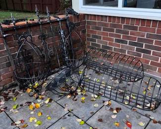 Outdoor wrought iron baskets and decor.