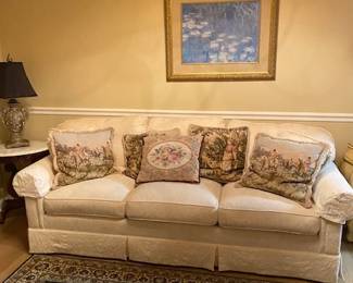 Ivory sofa and vintage pillows