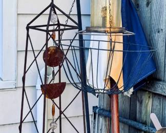 outdoor umbrella, shepherds hook, birdfeeder, metal