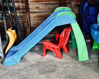child's play (plastic) slide, lawn chairs,