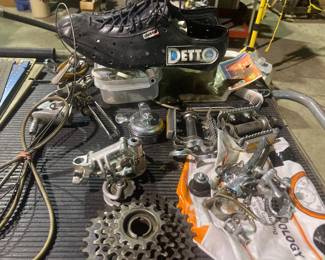 Bicycle parts (Campagnolo) and Detto biking shoes.