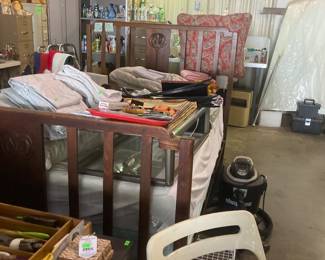 Sleep number mattress and antique bed.