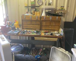 Wooden tool boxes, tools, work table.