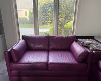 Purple leather loveseat