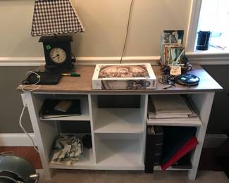 Bookcase, lamp, puzzle, postcards,etc.