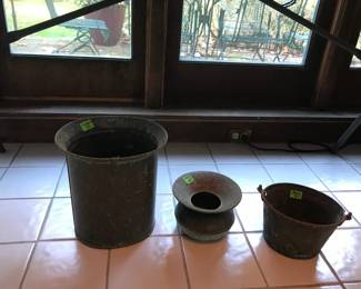 Brass buckets and spittoon.