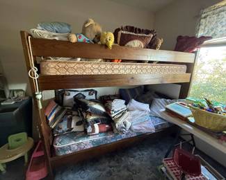 Twin-size bunk beds with mattresses.