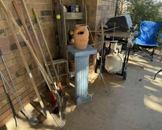 Yard tools and plant pots.