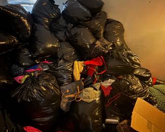 All brand new clothes, shoes and handbags we had to bag