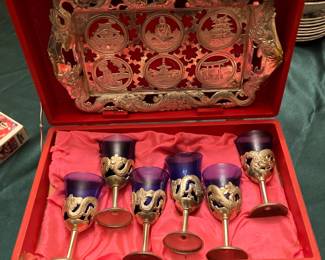 Set of silver and cobalt goblets with tray