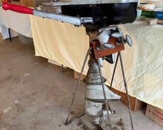 Vintage Martin "75" outboard. Has been living in a barn for years. Everything seems to be free. Has compression. Stand could be factory. 