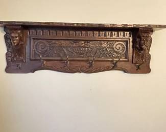 carved coat rack